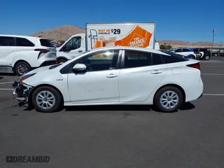 2021 Toyota Prius L Eco with VIN JTDKAMFU9M3133528, listed as a IAAI auction lot 41950856 with 138,787 mi miles. Bid and sale history available at carsss.com. Image 14.