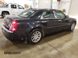 2005 Chrysler 300 C z VIN 2C3JA63H55H119210, wystawiony jako Copart lot #54727045 z przebiegiem 148 202 mil mil oraz Szkoda całkowita • Salvage title. Historia ofert i sprzedaży dostępna na DreamBid. Obrazek 3.