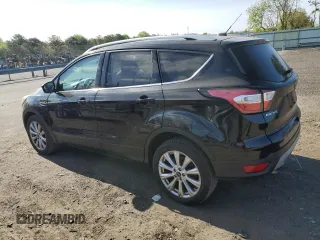 2017 Ford Escape Titanium with VIN 1FMCU9JD3HUD63223, listed as a Copart auction lot 53370004 with 128,666 mi miles and Non Repairable. Bid and sale history available at carsss.com. Image 2.