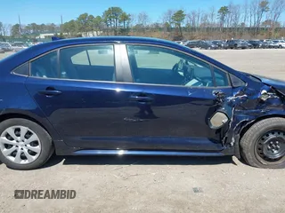2022 Toyota Corolla LE with VIN 5YFEPMAE8NP320053, listed as a IAAI auction lot 42020183 with 6,673 mi miles and . Bid and sale history available at carsss.com. Image 13.