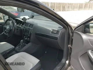 2015 Volkswagen Jetta SE z VIN 3VWD17AJ8FM403564, wystawiony jako IAAI lot #42016363 z przebiegiem 127 104 mil mil oraz . Historia ofert i sprzedaży dostępna na DreamBid. Obrazek 5.