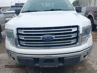 2014 Ford F-150 XL with VIN 1FTFW1CF2EKG46893, listed as a IAAI auction lot 41340410 with 158,798 mi miles and . Bid and sale history available at DreamBid. Image 6.