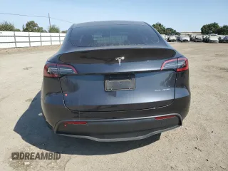 2024 Tesla Model Y Long Range with VIN 7SAYGAEE2RF101616, listed as a Copart auction lot 62236425 with 32,619 mi miles and Salvage title. Bid and sale history available at DreamBid. Image 6.