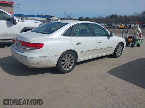 2009 Hyundai Azera Limited z VIN KMHFC46F99A368183, wystawiony jako IAAI lot #41769940 z przebiegiem 144 339 mil mil oraz . Historia ofert i sprzedaży dostępna na DreamBid. Obrazek 4.