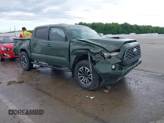 2021 Toyota Tacoma SR with VIN 3TMCZ5AN2MM377247, listed as a IAAI auction lot 42216182 with 114,984 mi miles and . Bid and sale history available at DreamBid. Image 1.