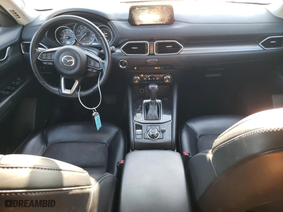 2018 Mazda CX-5 Touring with VIN JM3KFBCM9J0343240, listed as a Copart auction lot 88751245 with 132,038 mi miles and Salvage Title. Bid and sale history available at carsss.com. Image 8.