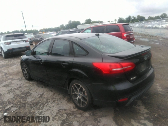 2015 Ford Focus SE with VIN 1FADP3F27FL304883, listed as a IAAI auction lot 42688252 with 90,590 mi miles and . Bid and sale history available at DreamBid. Image 3.