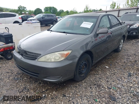 2004 Toyota Camry LE with VIN 4T1BE32K64U868802, listed as a IAAI auction lot 42141061 with 254,215 mi miles. Bid and sale history available at carsss.com. Image 2.