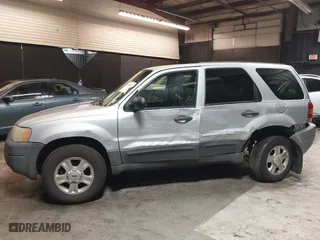 2004 Ford Escape XLT with VIN 1FMYU03164KA95424, listed as a IAAI auction lot 41810929 with 229,539 mi miles. Bid and sale history available at carsss.com. Image 14.