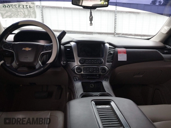 2017 Chevrolet Tahoe LT with VIN 1GNSCBKCXHR342170, listed as a IAAI auction lot 42137766 with 76,854 mi miles and . Bid and sale history available at DreamBid. Image 17.