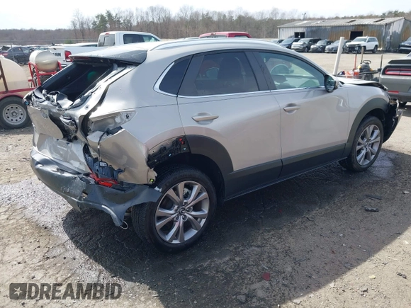 2022 Mazda CX-30 S Select with VIN 3MVDMBBL4NM401563, listed as a IAAI auction lot 41826878 with 4,733 mi miles and . Bid and sale history available at carsss.com. Image 4.