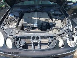 2005 Mercedes-Benz E-Class 3.2L with VIN WDBUF65J05A634879, listed as a IAAI auction lot 39904592 with 4,835 mi miles. Bid and sale history available at carsss.com. Image 10.
