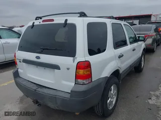 2007 Ford Escape XLT with VIN 1FMYU93147KA42293, listed as a IAAI auction lot 41586591 with 215,643 mi miles. Bid and sale history available at carsss.com. Image 4.