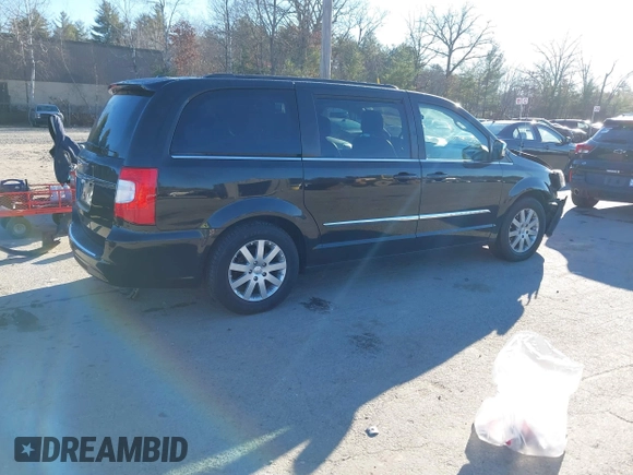 2011 Chrysler Town & Country Touring L z VIN 2A4RR8DG6BR803563, wystawiony jako IAAI lot #40921680 z przebiegiem 59 881 mil mil oraz . Historia ofert i sprzedaży dostępna na DreamBid. Obrazek 4.