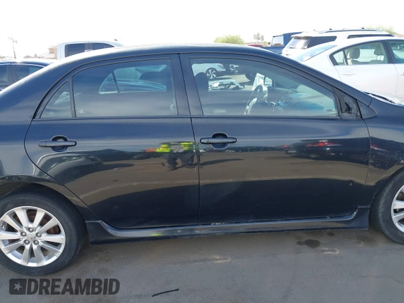 2010 Toyota Corolla with VIN 1NXBU4EE2AZ299148, listed as a IAAI auction lot 41884899 with 303,174 mi miles. Bid and sale history available at carsss.com. Image 13.