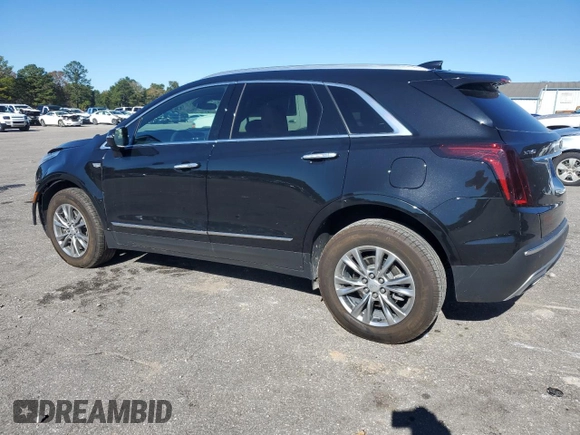 2023 Cadillac XT5 FWD Premium Luxury with VIN 1GYKNCR40PZ189444, listed as a Copart auction lot 84803094 with 22,827 mi miles and Clean Title. Bid and sale history available at carsss.com. Image 2.