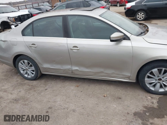 2015 Volkswagen Jetta Sedan 1.8T SE w/Connectivity with VIN 3VWD07AJ9FM326125, listed as a IAAI auction lot 41531163 with 141,284 mi miles. Bid and sale history available at carsss.com. Image 13.