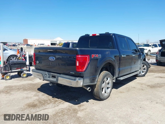 2022 Ford F-150 XL with VIN 1FTFW1E82NKD87353, listed as a IAAI auction lot 41769006 with 69,913 mi miles. Bid and sale history available at carsss.com. Image 4.