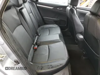 2017 Honda Civic EX-L z VIN 19XFC1F74HE209787, wystawiony jako Copart lot #56352415 z przebiegiem 130 264 mil mil oraz Szkoda całkowita • Salvage title. Historia ofert i sprzedaży dostępna na DreamBid. Obrazek 10.