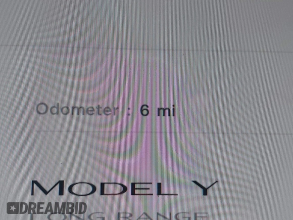 2025 Tesla Model Y Long Range with VIN 7SAYGDED0SA357488, listed as a IAAI auction lot 41550514 with 6 mi miles and . Bid and sale history available at DreamBid. Image 7.