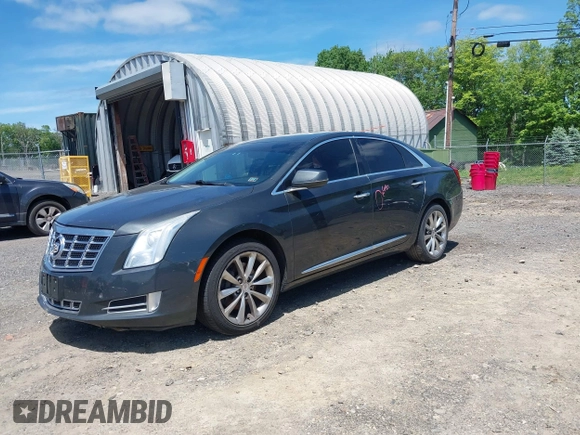 2013 Cadillac XTS Luxury z VIN 2G61R5S33D9101434, wystawiony jako IAAI lot #42290199 z przebiegiem 48 075 mil mil oraz . Historia ofert i sprzedaży dostępna na DreamBid. Obrazek 2.