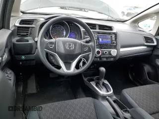 2015 Honda Fit LX z VIN 3HGGK5H58FM785137, wystawiony jako Copart lot #59013315 z przebiegiem 84 592 mil mil oraz Szkoda całkowita • Salvage title. Historia ofert i sprzedaży dostępna na DreamBid. Obrazek 8.