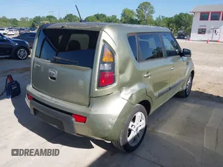 2011 Kia Soul + with VIN KNDJT2A23B7278814, listed as a IAAI auction lot 41998183 with 166,598 mi miles. Bid and sale history available at carsss.com. Image 4.