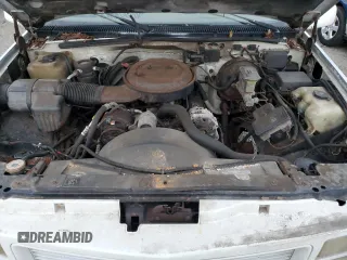 1995 GMC Suburban z VIN 1GKFK16K3SJ704911, wystawiony jako Copart lot #88326825 z przebiegiem 191 006 mil mil oraz Szkoda całkowita • Salvage title. Historia ofert i sprzedaży dostępna na DreamBid. Obrazek 12.