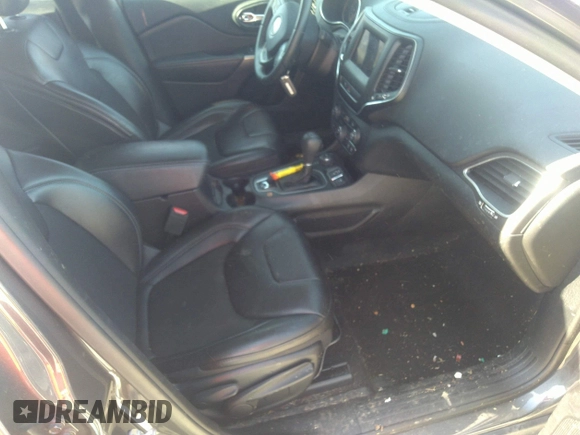 2019 Jeep Cherokee Latitude Plus with VIN 1C4PJMLX9KD413915, listed as a IAAI auction lot 41747608 with 50,390 mi miles and . Bid and sale history available at DreamBid. Image 5.