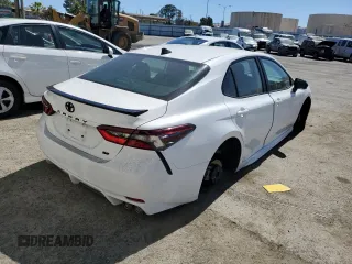 2023 Toyota Camry SE with VIN 4T1G11AK6PU115976, listed as a Copart auction lot 61074124 with 11,022 mi miles and Clean Title. Bid and sale history available at DreamBid. Image 3.
