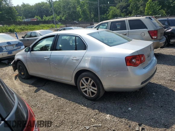 2007 Volkswagen Jetta Wolfsburg Edition z VIN 3VWEF71K07M168433, wystawiony jako Copart lot #60796705 z przebiegiem Nie podano mil oraz Szkoda całkowita • Salvage title. Historia ofert i sprzedaży dostępna na DreamBid. Obrazek 2.