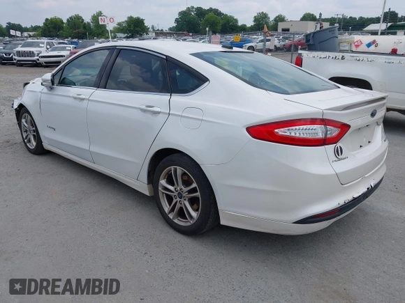 2015 Ford Fusion SE Hybrid with VIN 3FA6P0LU2FR305597, listed as a IAAI auction lot 42168292 with 97,688 mi miles and . Bid and sale history available at DreamBid. Image 3.