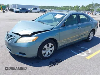 2007 Toyota Camry CE with VIN JTNBE46K773029333, listed as a IAAI auction lot 42049061 with 148,600 mi miles. Bid and sale history available at carsss.com. Image 2.