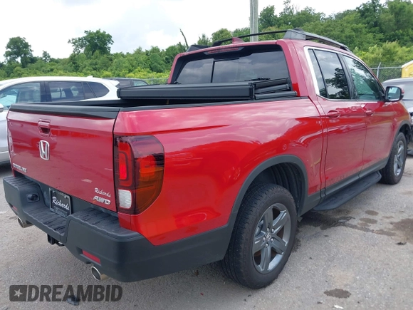 2023 Honda Ridgeline RTL with VIN 5FPYK3F53PB059323, listed as a IAAI auction lot 42485621 with Not provided miles and . Bid and sale history available at DreamBid. Image 4.