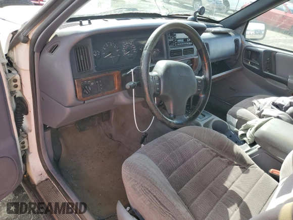 1997 Jeep Grand Cherokee Laredo with VIN 1J4GZ58S8VC647415, listed as a Copart auction lot 49258934 with 0 mi miles and Salvage Title. Bid and sale history available at carsss.com. Image 8.