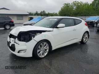 2013 Hyundai Veloster w/Black Int z VIN KMHTC6AD8DU132636, wystawiony jako Copart lot #58086555 z przebiegiem 128 753 mil mil oraz Szkoda całkowita • Salvage title. Historia ofert i sprzedaży dostępna na DreamBid. Obrazek 1.