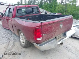 2014 Ram 1500 SLT z VIN 1C6RR6GT6ES408358, wystawiony jako IAAI lot #42038597 z przebiegiem Nie podano mil oraz . Historia ofert i sprzedaży dostępna na DreamBid. Obrazek 3.