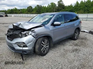 2017 Honda Pilot Touring with VIN 5FNYF5H96HB016038, listed as a Copart auction lot 56423995 with 99,096 mi miles and Salvage title. Bid and sale history available at DreamBid. Image 1.