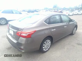 2016 Nissan Sentra S with VIN 3N1AB7AP3GL648029, listed as a IAAI auction lot 36926968 with 122,251 mi miles and . Bid and sale history available at DreamBid. Image 4.
