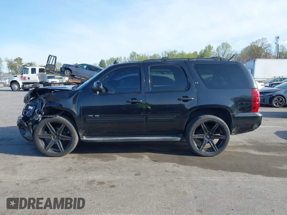2014 Chevrolet Tahoe LT with VIN 1GNSCBE0XER202150, listed as a IAAI auction lot 41922771 with 168,693 mi miles and . Bid and sale history available at DreamBid. Image 14.