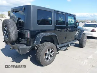 2008 Jeep Wrangler Unlimited Sahara with VIN 1J8GA59168L587554, listed as a IAAI auction lot 41963587 with 189,943 mi miles and . Bid and sale history available at DreamBid. Image 4.
