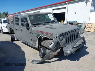 2023 Jeep Gladiator Rubicon with VIN 1C6JJTBG6PL538859, listed as a IAAI auction lot 42633055 with 22,899 mi miles and . Bid and sale history available at DreamBid. Image 6.