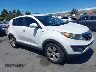 2012 Kia Sportage LX z VIN KNDPBCA21C7297706, wystawiony jako IAAI lot #42804922 z przebiegiem 187 840 mil mil oraz . Historia ofert i sprzedaży dostępna na DreamBid. Obrazek 1.