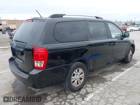 2012 Kia Sedona LX with VIN KNDMG4C78C6502141, listed as a IAAI auction lot 41725800 with 153,789 mi miles and . Bid and sale history available at carsss.com. Image 4.