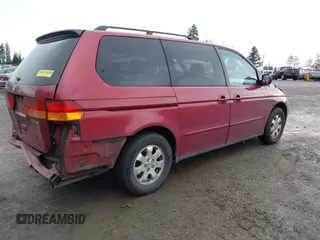 2003 Honda Odyssey EX z VIN 5FNRL18683B080893, wystawiony jako IAAI lot #41840931 z przebiegiem 218 794 mil mil oraz . Historia ofert i sprzedaży dostępna na DreamBid. Obrazek 4.