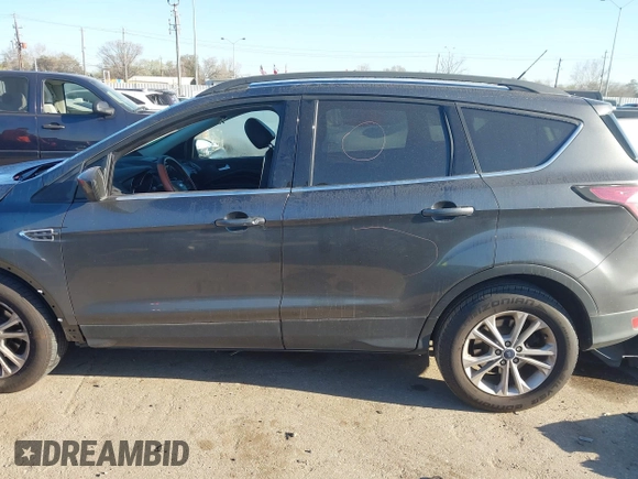 2017 Ford Escape SE z VIN 1FMCU0GD9HUB38906, wystawiony jako IAAI lot #41772488 z przebiegiem 108 259 mil mil oraz . Historia ofert i sprzedaży dostępna na DreamBid. Obrazek 15.