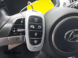 2022 Hyundai Tucson SEL z VIN 5NMJF3AE5NH135237, wystawiony jako IAAI lot #42324113 z przebiegiem 44 077 mil mil oraz . Historia ofert i sprzedaży dostępna na DreamBid. Obrazek 11.