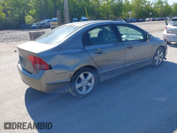 2006 Honda Civic LX z VIN 2HGFA16556H526744, wystawiony jako IAAI lot #42360805 z przebiegiem 236 970 mil mil oraz . Historia ofert i sprzedaży dostępna na DreamBid. Obrazek 4.