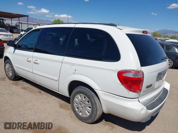 2005 Chrysler Town & Country LX with VIN 2C4GP44R75R213048, listed as a IAAI auction lot 42068985 with 100,688 mi miles and . Bid and sale history available at DreamBid. Image 3.
