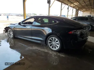 2018 Tesla Model S 75D with VIN 5YJSA1E27JF264759, listed as a Copart auction lot 59610855 with 104,375 mi miles and Salvage title. Bid and sale history available at DreamBid. Image 2.